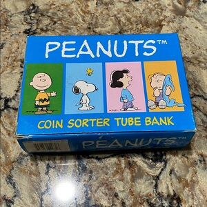vintage Peanuts TM coin sorter tube bank with box. It was used some